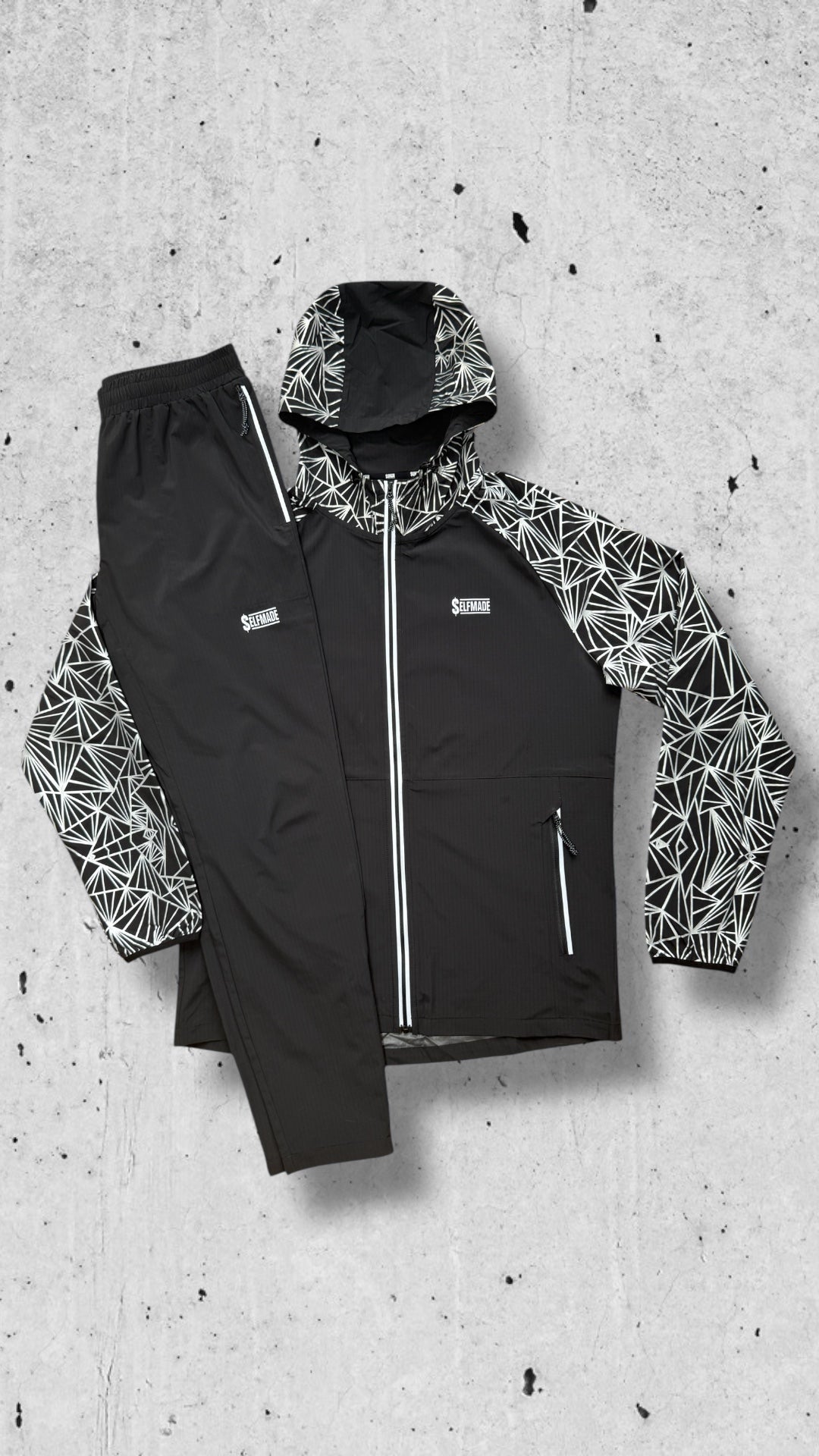 REFLECT WOVEN BLACK WINDBREAKER PANTS